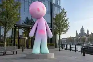Vaporwave cartoon abstract character sculpture on an Amsterdam media company plaza