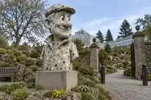 Terrazzo pattern cartoon bust of a head gardener in a botanical garden in Edinburgh