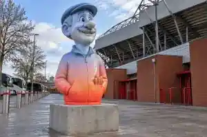Sunset gradient cartoon bust of a football club groundsman on a Liverpool stadium concourse