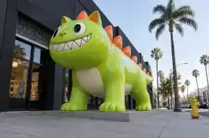 Kaiju toy style cartoon cat sculpture outside a Los Angeles designer toy store