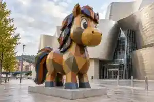 Cubist faceted cartoon pony sculpture in fibreglass on a Bilbao museum forecourt